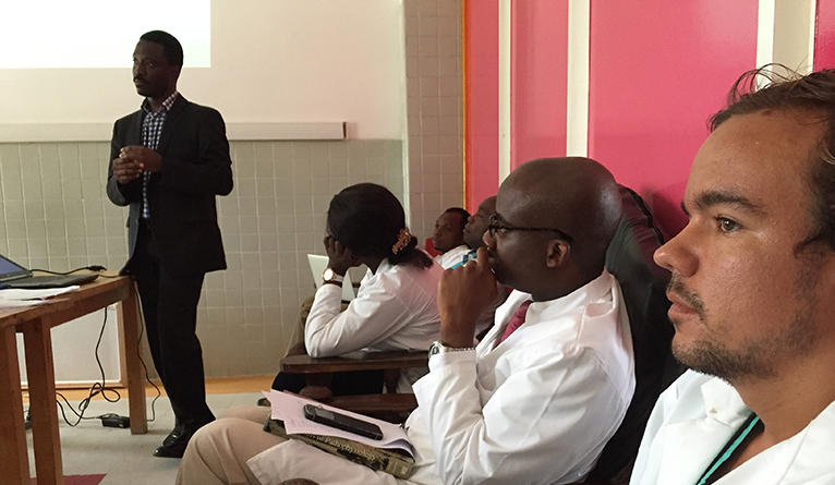 Dr. Ogbuagu leading a journal club session for residents and faculty of in the Internal Medicine training program.