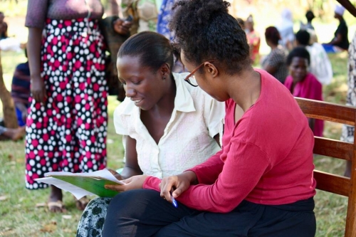 Nadira, one of our team members, conducts an English reading test with a CHP candidate in Buyengo. All CHPs must be able to read and interpret English, and finding out their reading ability is a key part of the interview day, which also includes an exam. 