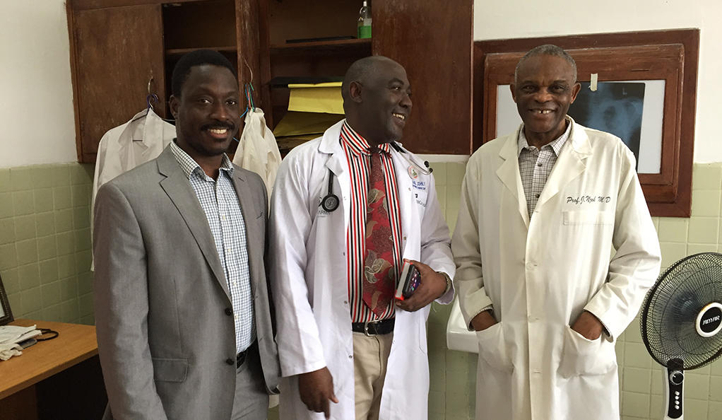 Yale’s Dr. Onyema Ogbuagu (left) with Dr. Ssentamu, acting chair of Medicine at JFK Medical Center in Liberia (middle), and Dr. Joseph Njoh, senior faculty in Department of Medicine (right).