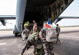 The last of the French soldiers deployed in the Central African Republic board a cargo plane to leave the Bangui airport on Dec. 15, 2022. BARBARA DEBOUT/AFP VIA GETTY IMAGES